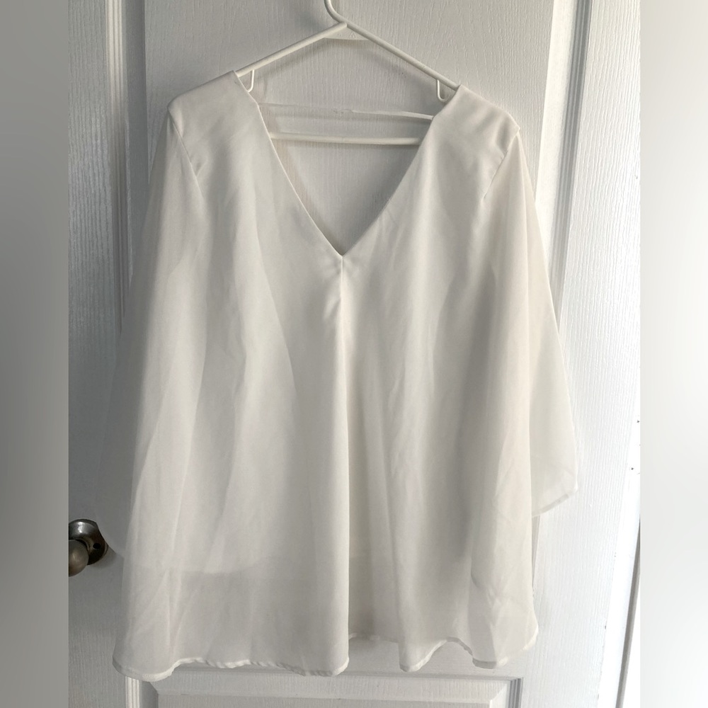 White blouse with sheer back
